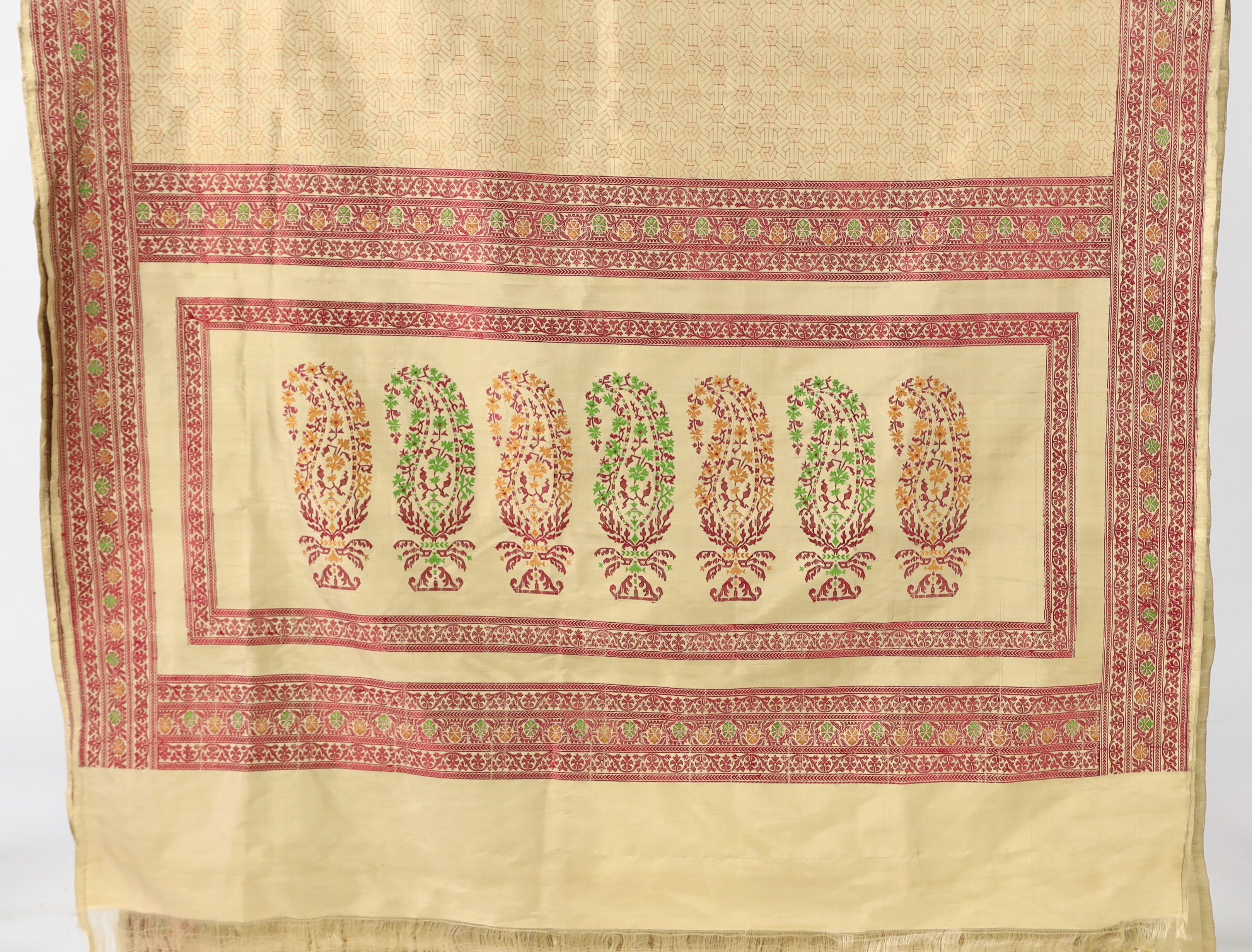 An Indian Varansi, 1980’s, hand woven silk sari by Mohammad Jafar Ali, woven in traditional style as a wedding sari, unused, 620cm long, 115cm wide, comes with provenance